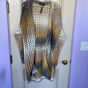 In new condition knit sweater